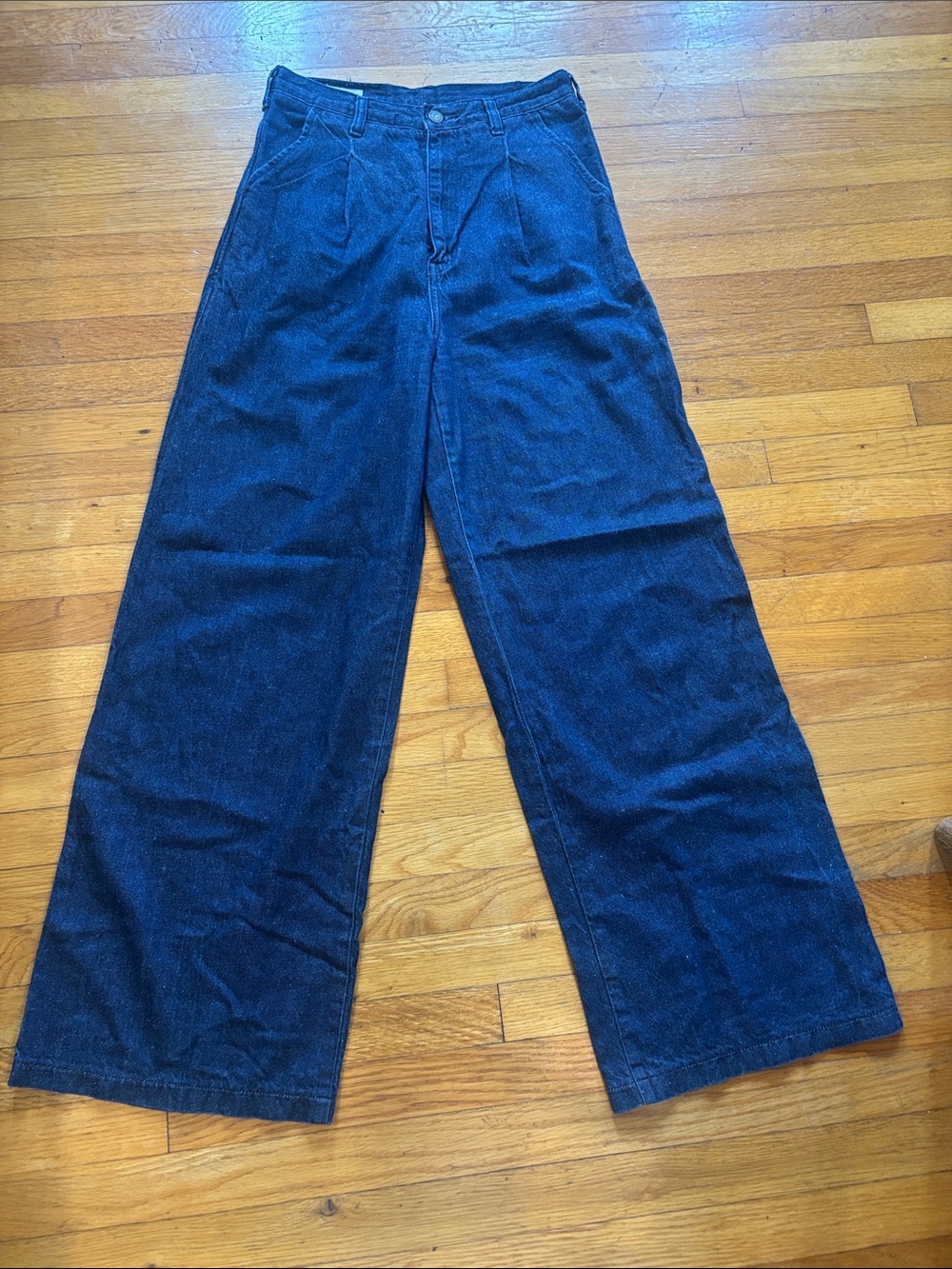 LEVI Premium Felix the Cat wide-legged pleated jeans.